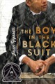 Go to record The boy in the black suit